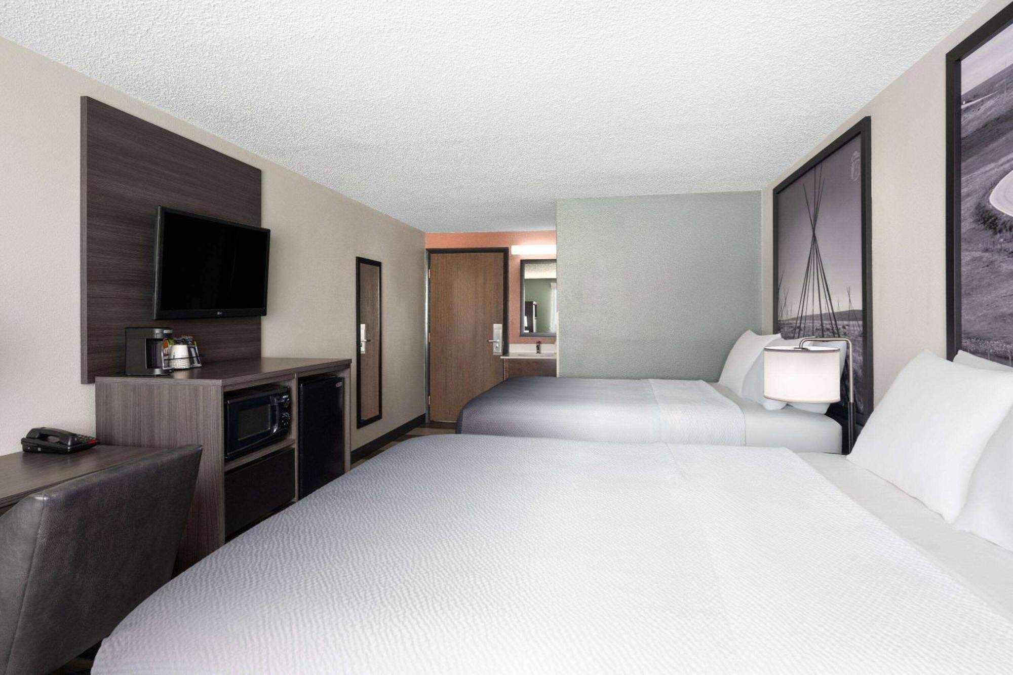 Hotel Super 8 By Wyndham Conrad Exterior foto